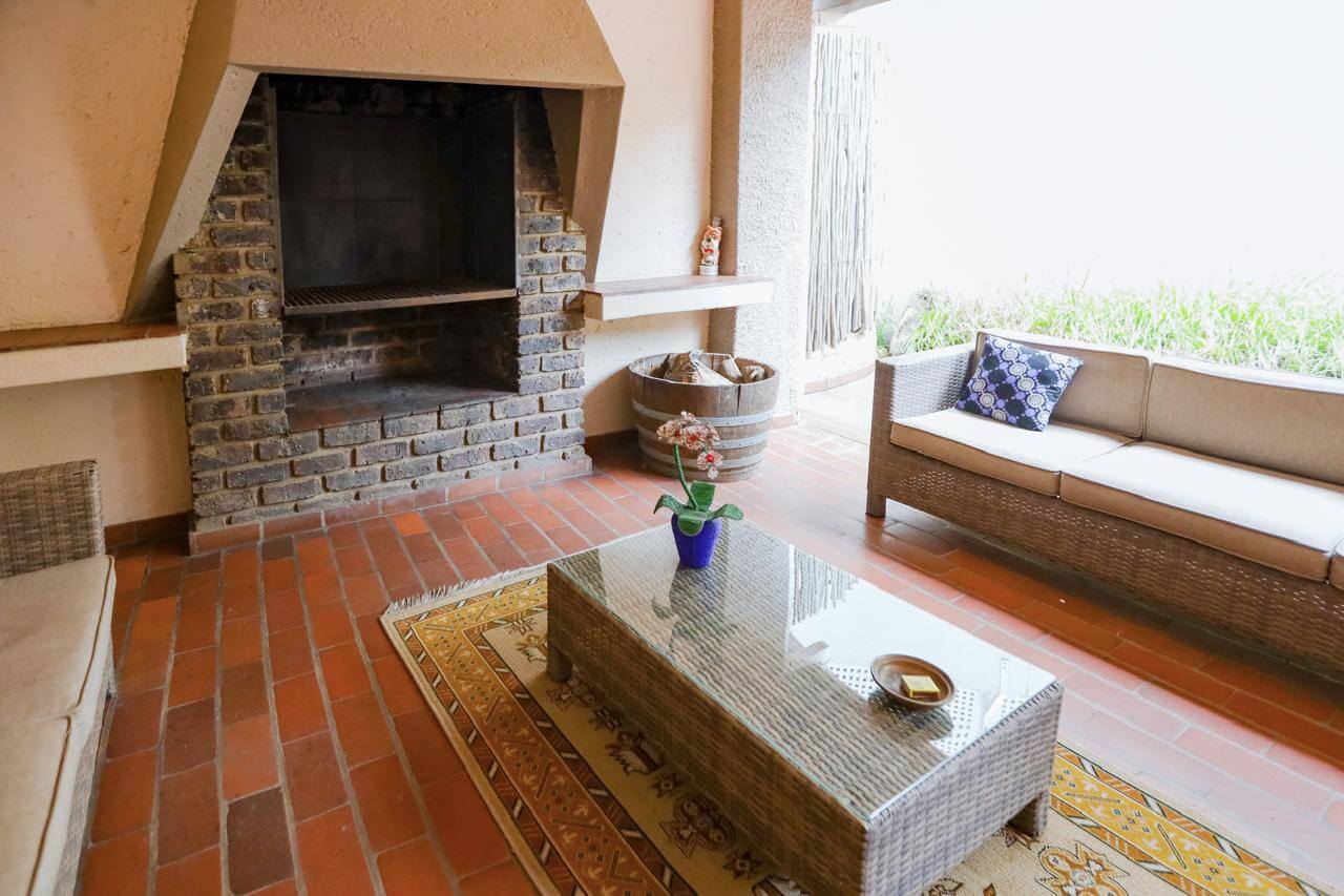 Fireside guest lounge at 59 on Central, Illovo