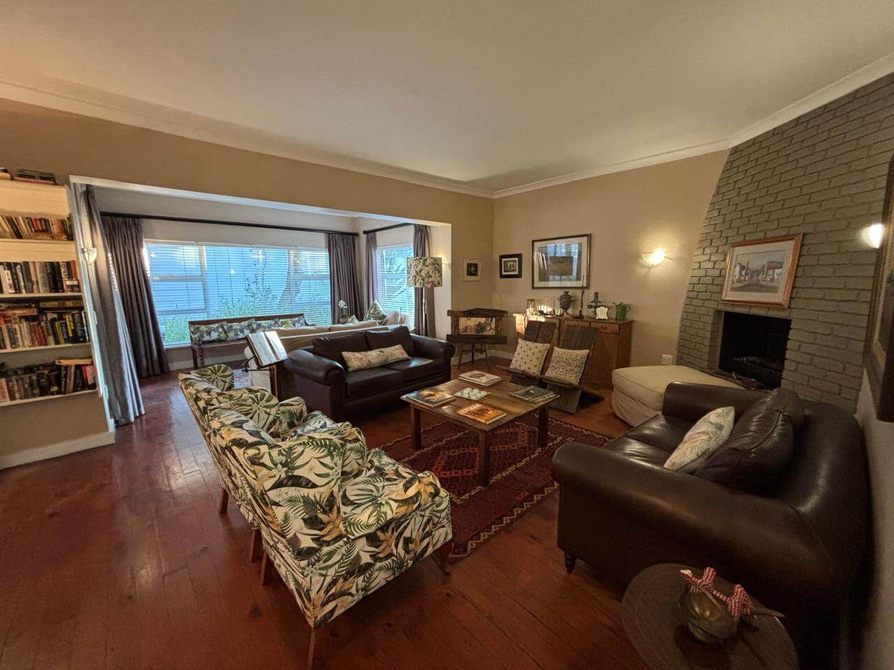 The guest lounge with DVD library and bookshelf at 59 on Central